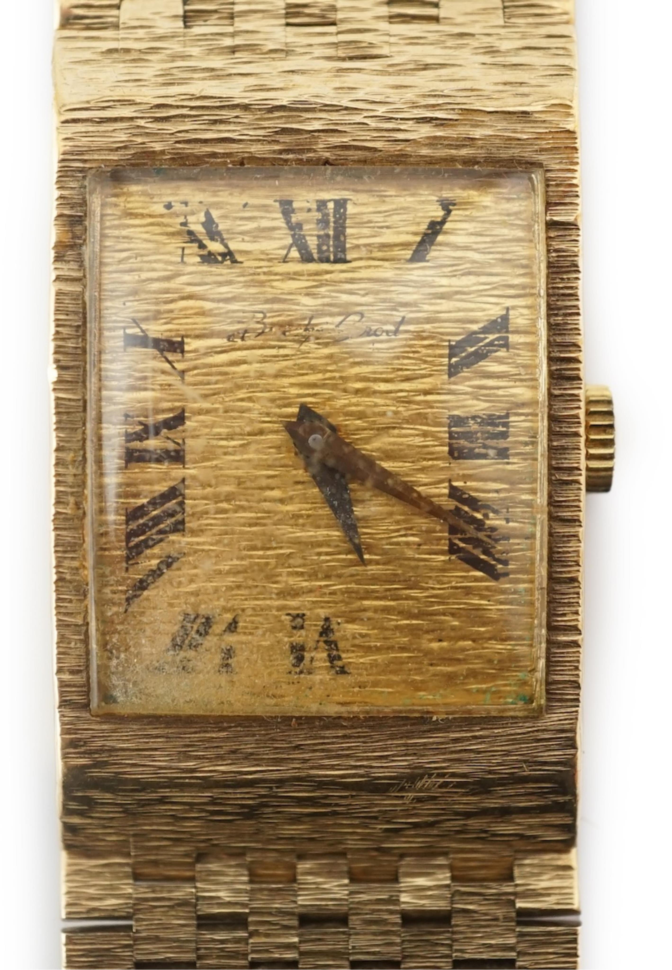 A 1960's 9ct gold Bueche Girod manual wind dress wrist watch, on a textured 9ct gold bracelet